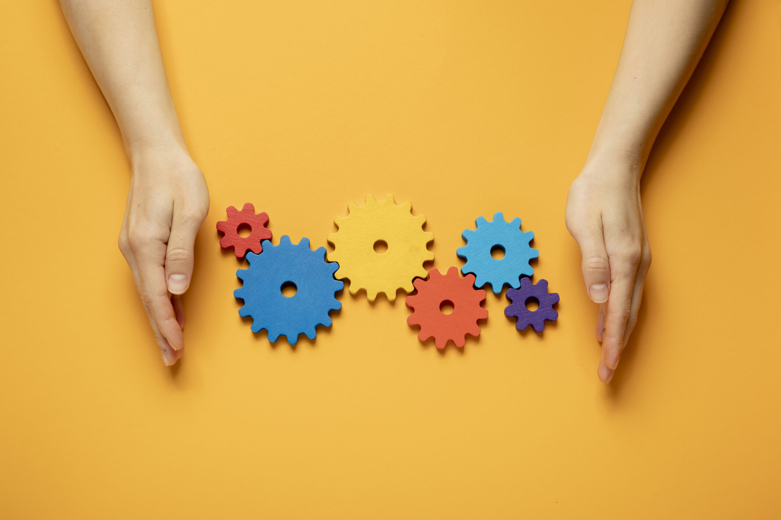 colorful-cogwheels-arrangement-flat-lay